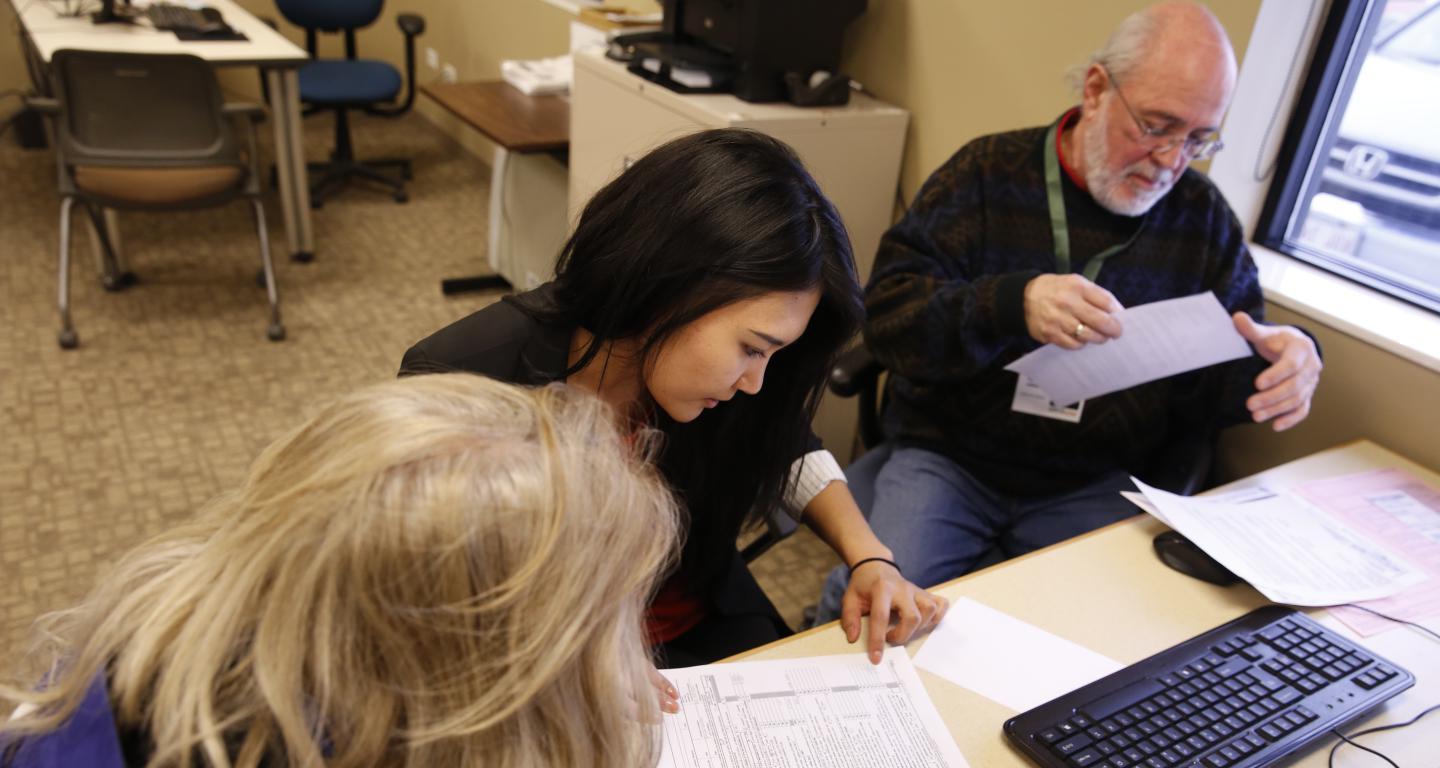 student helping with taxes